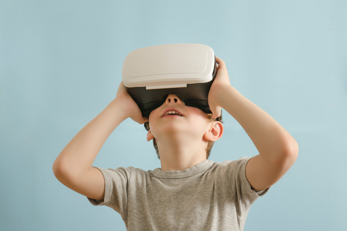 Boy with Glasses of Virtual Reality